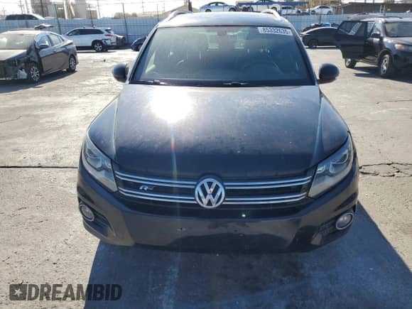 2015 Volkswagen Tiguan SEL z VIN WVGBV7AX1FW504346, wystawiony jako Copart lot #85332635 z przebiegiem 89 744 mil mil oraz Szkoda całkowita • Salvage title. Historia ofert i sprzedaży dostępna na DreamBid. Obrazek 5.
