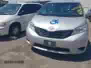 2014 Toyota Sienna L with VIN 5TDZK3DC9ES518653, listed as a IAAI auction lot 42767591 with 261,730 mi miles and . Bid and sale history available at DreamBid. Image 6.