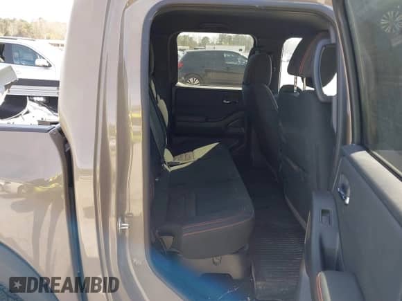 2023 Nissan Frontier Pro-4X with VIN 1N6ED1EKXPN620732, listed as a IAAI auction lot 41839561 with 27,496 mi miles and . Bid and sale history available at DreamBid. Image 8.