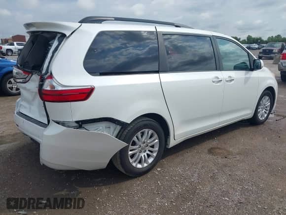 2015 Toyota Sienna XLE with VIN 5TDYK3DC1FS530972, listed as a IAAI auction lot 42896200 with 87,071 mi miles and . Bid and sale history available at DreamBid. Image 4.