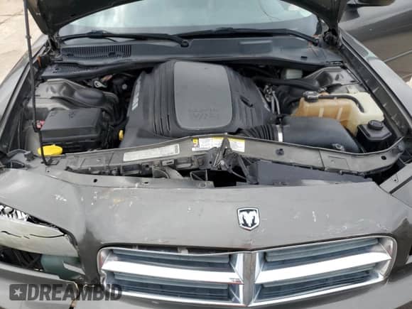 2010 Dodge Charger R/T z VIN 2B3CA5CT1AH151442, wystawiony jako Copart lot #69857745 z przebiegiem 134 359 mil mil oraz Szkoda całkowita • Salvage title. Historia ofert i sprzedaży dostępna na DreamBid. Obrazek 11.