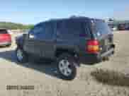 1998 Jeep Grand Cherokee Limited с VIN 1J4GZ78Y5WC190399, выставлен на аукционе Copart как лот 81995675 с пробегом 246 392 миль миль и Списание • Salvage title. История ставок и продаж доступна на DreamBid. Изображение 2.