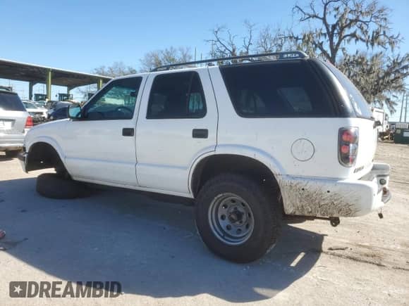 1998 Chevrolet Blazer LT z VIN 1GNDT13W0W2139791, wystawiony jako Copart lot #82224464 z przebiegiem 171 508 mil mil oraz Nie do naprawy • Non repairable. Historia ofert i sprzedaży dostępna na DreamBid. Obrazek 2.