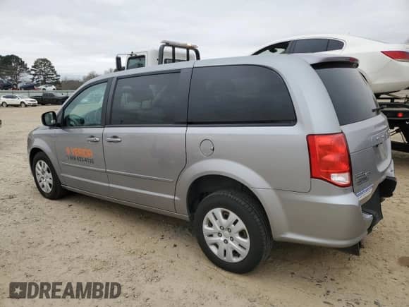 2016 Dodge Grand Caravan American Value with VIN 2C4RDGBG2GR219573, listed as a Copart auction lot 48353045 with 328,933 mi miles and Salvage title. Bid and sale history available at DreamBid. Image 2.