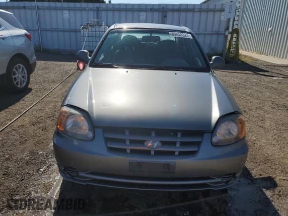 2005 Hyundai Accent GLS с VIN KMHCG45C05U605716, выставлен на аукционе Copart как лот 69445324 с пробегом 158 082 миль миль и Чистый • Clean title. История ставок и продаж доступна на DreamBid. Изображение 5.