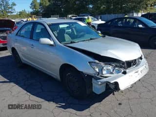 2002 Toyota Camry LE z VIN 4T1BE32K12U051024, wystawiony jako IAAI lot #43323194 z przebiegiem 173 974 mil mil oraz . Historia ofert i sprzedaży dostępna na DreamBid. Obrazek 1.