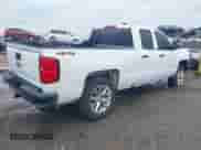 2018 Chevrolet Silverado 1500 Work Truck with VIN 1GCVKNEC3JZ328185, listed as a IAAI auction lot 42390893 with 217,717 mi miles and . Bid and sale history available at DreamBid. Image 4.