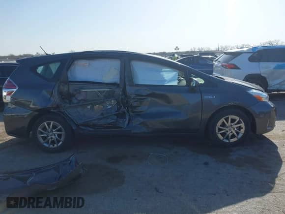 2016 Toyota Prius Two z VIN JTDZN3EU1GJ049699, wystawiony jako IAAI lot #41852685 z przebiegiem 53 751 mil mil oraz . Historia ofert i sprzedaży dostępna na DreamBid. Obrazek 13.