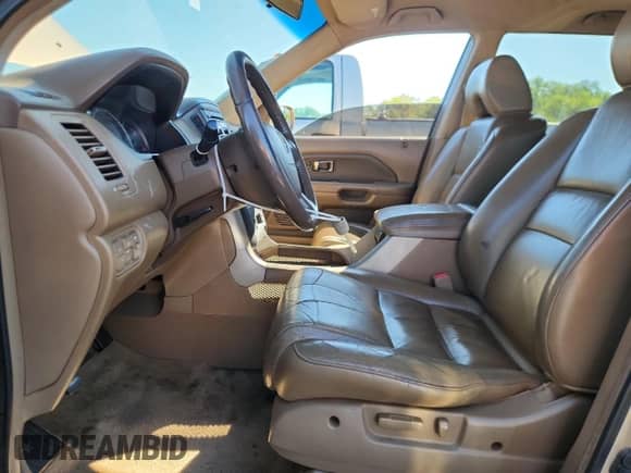 2006 Honda Pilot EX-L with VIN 2HKYF18616H525614, listed as a Copart auction lot 69956975 with 203,446 mi miles and Salvage title. Bid and sale history available at DreamBid. Image 7.