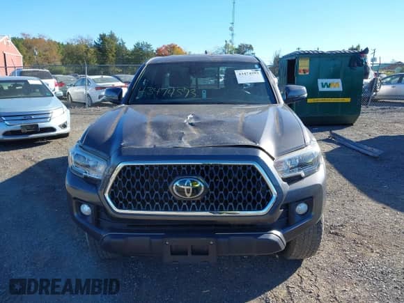 2018 Toyota Tacoma SR5 with VIN 5TFSZ5AN8JX150047, listed as a IAAI auction lot 43474593 with 38,427 mi miles and . Bid and sale history available at DreamBid. Image 12.
