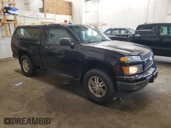 2011 Chevrolet Colorado 1LT with VIN 1GCGTCFE4B8130930, listed as a Copart auction lot 58435815 with 147,002 mi miles and Salvage title. Bid and sale history available at DreamBid. Image 4.