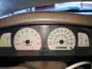 2001 Toyota Tacoma PreRunner z VIN 5TEGN92N71Z859665, wystawiony jako Copart lot #84799325 z przebiegiem 202 008 mil mil oraz Szkoda całkowita • Salvage title. Historia ofert i sprzedaży dostępna na DreamBid. Obrazek 9.
