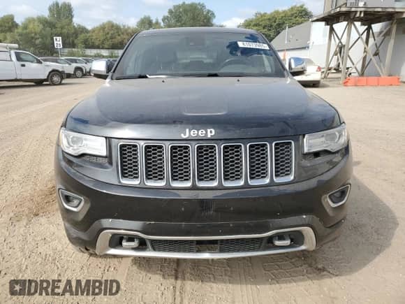 2015 Jeep Grand Cherokee Overland с VIN 1C4RJFCG0FC950706, выставлен на аукционе Copart как лот 81073985 с пробегом 138 367 миль миль и Чистый • Clean title. История ставок и продаж доступна на DreamBid. Изображение 5.