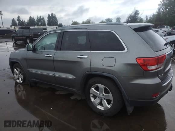 2012 Jeep Grand Cherokee Limited z VIN 1C4RJFBG2CC187150, wystawiony jako Copart lot #84956805 z przebiegiem 136 040 mil mil oraz Szkoda całkowita • Salvage title. Historia ofert i sprzedaży dostępna na DreamBid. Obrazek 2.