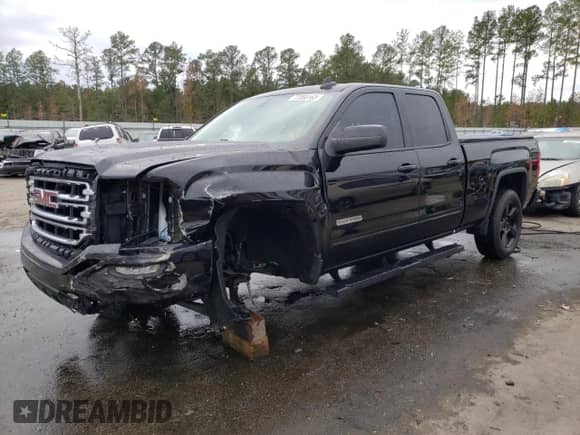 2017 GMC Sierra 1500 SLE z VIN 1GTR1MECXHZ338866, wystawiony jako Copart lot #77050163 z przebiegiem 51 798 mil mil oraz Czysty tytuł • Clean title. Historia ofert i sprzedaży dostępna na DreamBid. Obrazek 1.
