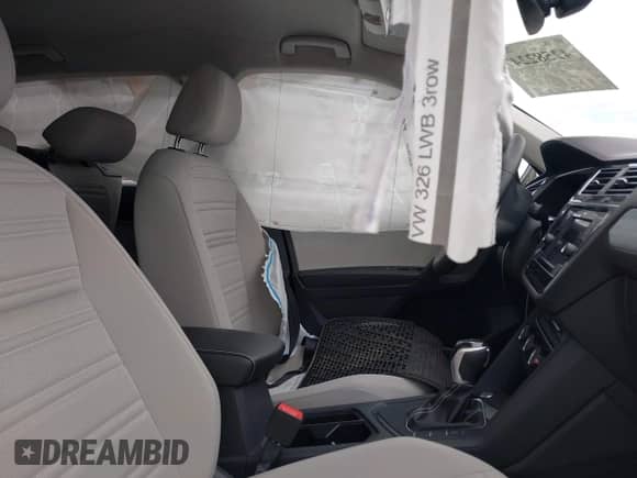 2022 Volkswagen Tiguan S with VIN 3VV1B7AX4NM141775, listed as a IAAI auction lot 42582247 with 53,069 mi miles and . Bid and sale history available at DreamBid. Image 5.