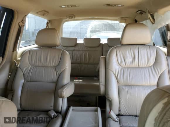 2005 Honda Odyssey Touring с VIN 5FNRL38835B039040, выставлен на аукционе Copart как лот 82335395 с пробегом 188 854 миль миль и Списание • Salvage title. История ставок и продаж доступна на DreamBid. Изображение 10.