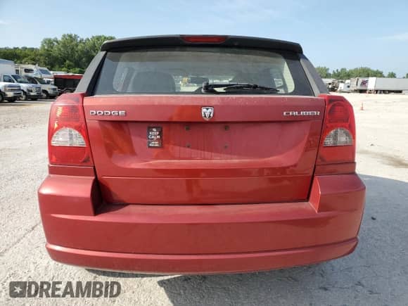 2010 Dodge Caliber Uptown with VIN 1B3CB9HB9AD615238, listed as a Copart auction lot 64318955 with 208,798 mi miles and Salvage title. Bid and sale history available at DreamBid. Image 6.