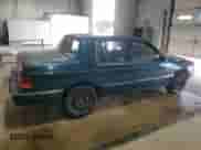 1994 Dodge Spirit with VIN 3B3AA4638RT310022, listed as a Copart auction lot 63479515 with 157,435 mi miles and Salvage title. Bid and sale history available at DreamBid. Image 3.