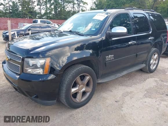 2014 Chevrolet Tahoe LS with VIN 1GNSCAE00ER122849, listed as a IAAI auction lot 42939558 with 186,637 mi miles and . Bid and sale history available at DreamBid. Image 2.