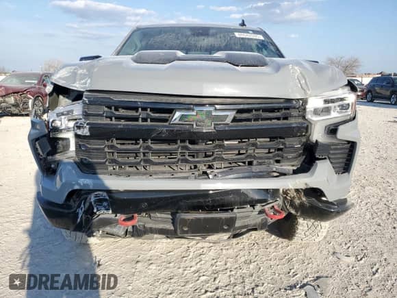 2024 Chevrolet Silverado 1500 LT Trail Boss z VIN 3GCUDFEL9RG421753, wystawiony jako Copart lot #46942695 z przebiegiem 6 858 mil mil oraz Szkoda całkowita • Salvage title. Historia ofert i sprzedaży dostępna na DreamBid. Obrazek 5.