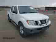2015 Nissan Frontier SV with VIN 1N6AD0ER4FN751322, listed as a IAAI auction lot 43276518 with 124,404 mi miles and . Bid and sale history available at DreamBid. Image 1.