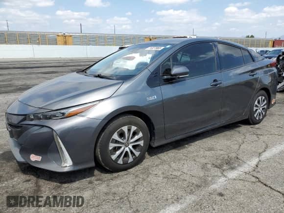 2020 Toyota Prius LE z VIN JTDKARFP8L3157745, wystawiony jako Copart lot #71327865 z przebiegiem 99 386 mil mil oraz Szkoda całkowita • Salvage title. Historia ofert i sprzedaży dostępna na DreamBid. Obrazek 1.