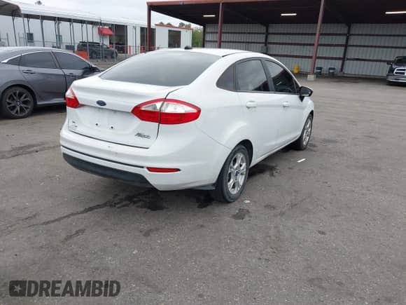 2015 Ford Fiesta SE with VIN 3FADP4BJ6FM198783, listed as a IAAI auction lot 43321519 with 172,732 mi miles and . Bid and sale history available at DreamBid. Image 4.