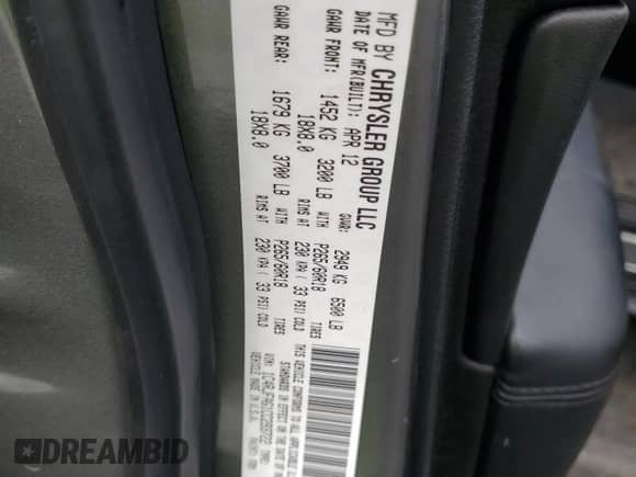 2012 Jeep Grand Cherokee Laredo with VIN 1C4RJFAG1CC293722, listed as a Copart auction lot 68848665 with 114,707 mi miles and Salvage title. Bid and sale history available at DreamBid. Image 13.