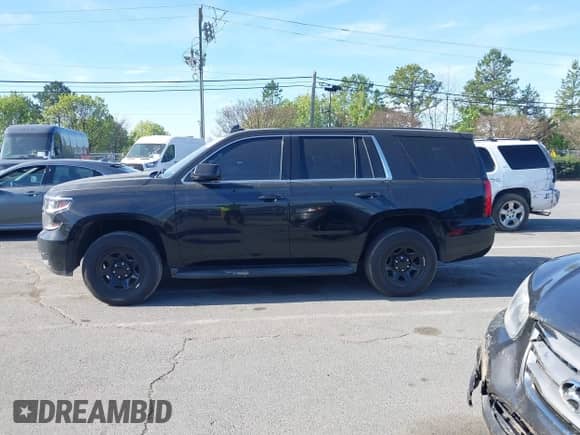 2017 Chevrolet Tahoe with VIN 1GNLCDKCXHR240934, listed as a IAAI auction lot 41430391 with 167,428 mi miles and . Bid and sale history available at DreamBid. Image 14.
