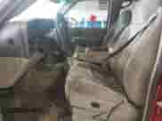 2004 Chevrolet Tahoe LT with VIN 1GNEK13Z94J281741, listed as a Copart auction lot 80125185 with 16,404 mi miles and Salvage title. Bid and sale history available at DreamBid. Image 7.