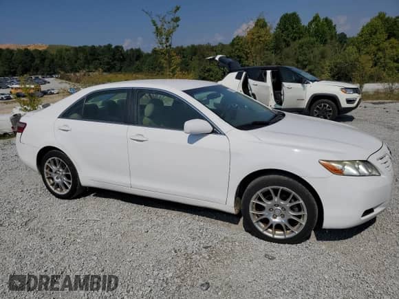 2007 Toyota Camry LE с VIN 4T1BK46K27U552262, выставлен на аукционе Copart как лот 71686145 с пробегом 106 986 миль миль и Списание • Salvage title. История ставок и продаж доступна на DreamBid. Изображение 4.