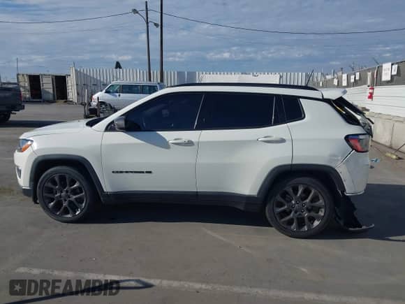 2021 Jeep Compass 80th Anniversary with VIN 3C4NJCEB2MT561291, listed as a IAAI auction lot 43292888 with 102,919 mi miles and . Bid and sale history available at DreamBid. Image 14.