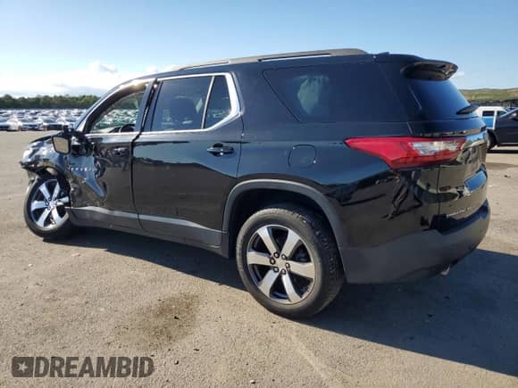 2021 Chevrolet Traverse LT with VIN 1GNEVHKW8MJ256093, listed as a Copart auction lot 70824565 with 50,721 mi miles and Salvage title. Bid and sale history available at DreamBid. Image 2.