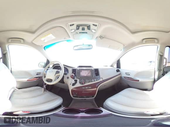 2012 Toyota Sienna XLE with VIN 5TDYK3DC9CS207913, listed as a Copart auction lot 82689705 with 188,992 mi miles and Salvage title. Bid and sale history available at DreamBid. Image 16.