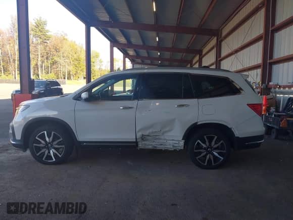 2021 Honda Pilot Elite с VIN 5FNYF6H02MB045070, выставлен на аукционе IAAI как лот 43354788 с пробегом 59 863 миль миль и . История ставок и продаж доступна на DreamBid. Изображение 14.