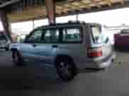 2002 Subaru Forester S with VIN JF1SF65602H712543, listed as a Copart auction lot 67325015 with 214,238 mi miles and Salvage title. Bid and sale history available at DreamBid. Image 2.