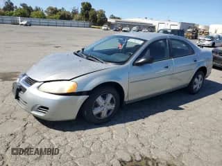 2005 Dodge Stratus SXT with VIN 1B3EL46X05N578698, listed as a Copart auction lot 66136315 with 101,641 mi miles and Salvage title. Bid and sale history available at DreamBid. Image 1.