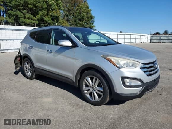 2015 Hyundai Santa Fe with VIN 5XYZWDLA2FG275552, listed as a Copart auction lot 87177805 with 188,947 mi miles and Salvage title. Bid and sale history available at DreamBid. Image 4.