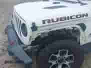 2021 Jeep Wrangler Unlimited Rubicon with VIN 1C4HJXFG9MW714239, listed as a IAAI auction lot 42874381 with 81,545 mi miles and . Bid and sale history available at DreamBid. Image 6.