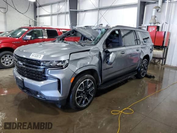 2022 Chevrolet Suburban RST с VIN 1GNSKEKD8NR239600, выставлен на аукционе Copart как лот 64103875 с пробегом 21 369 миль миль и Списание • Salvage title. История ставок и продаж доступна на DreamBid. Изображение 1.
