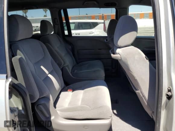 2009 Honda Odyssey LX с VIN 5FNRL38289B011221, выставлен на аукционе Copart как лот 69606165 с пробегом Не указан миль и Списание • Salvage title. История ставок и продаж доступна на DreamBid. Изображение 11.