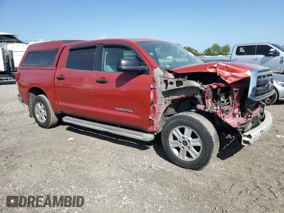 2011 Toyota Tundra SR5 with VIN 5TFDM5F18BX019134, listed as a Copart auction lot 52141595 with 79,171 mi miles and Salvage title. Bid and sale history available at DreamBid. Image 4.