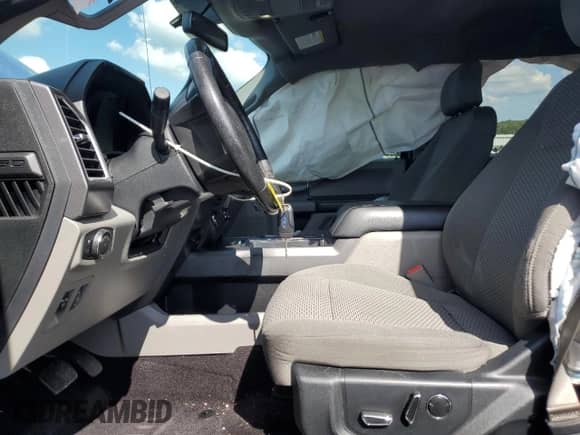 2016 Ford F-150 XLT z VIN 1FTEW1E87GKE22306, wystawiony jako Copart lot #84208945 z przebiegiem 146 077 mil mil oraz Szkoda całkowita • Salvage title. Historia ofert i sprzedaży dostępna na DreamBid. Obrazek 7.