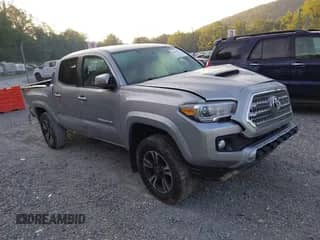 2016 Toyota Tacoma SR z VIN 3TMCZ5AN7GM019954, wystawiony jako IAAI lot #42625373 z przebiegiem 235 506 mil mil oraz . Historia ofert i sprzedaży dostępna na DreamBid. Obrazek 1.