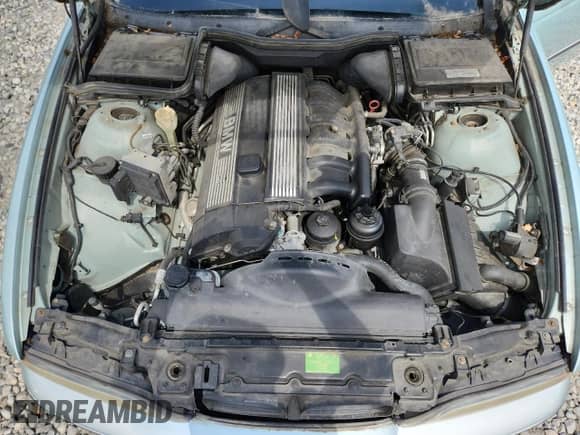 1998 BMW 5 Series 528i с VIN WBADD5328WBV56373, выставлен на аукционе Copart как лот 64599115 с пробегом 195 450 миль миль и Чистый • Clean title. История ставок и продаж доступна на DreamBid. Изображение 11.