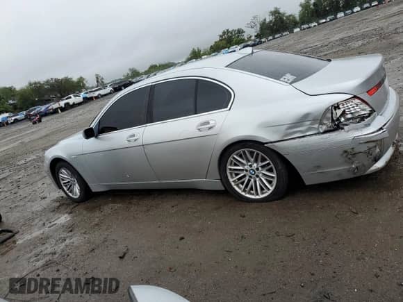 2004 BMW 7 Series 745i with VIN WBAGL634X4DP70421, listed as a Copart auction lot 73309744 with 123,457 mi miles and Salvage title. Bid and sale history available at DreamBid. Image 2.