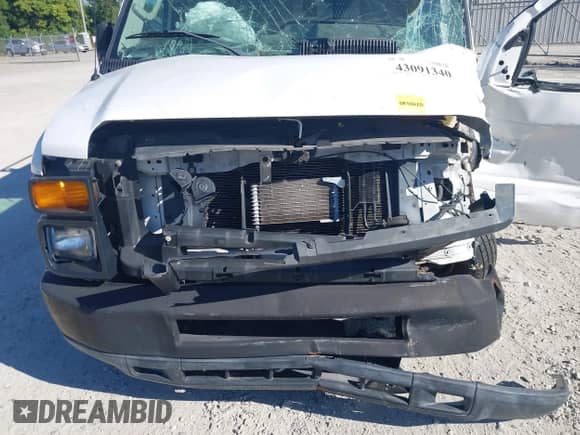 2011 Ford Econoline Cargo Commercial with VIN 1FTNE1EW8BDB06699, listed as a IAAI auction lot 43091340 with 181,040 mi miles and . Bid and sale history available at DreamBid. Image 18.