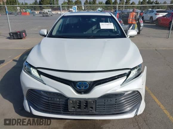 2020 Toyota Camry Hybrid XLE with VIN 4T1F31AK4LU523702, listed as a IAAI auction lot 42734831 with 144,778 mi miles and . Bid and sale history available at DreamBid. Image 12.