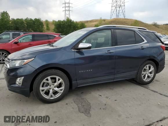 2019 Chevrolet Equinox Premier with VIN 3GNAXNEV4KL308948, listed as a Copart auction lot 69116065 with 36,320 mi miles and Salvage title. Bid and sale history available at DreamBid. Image 1.